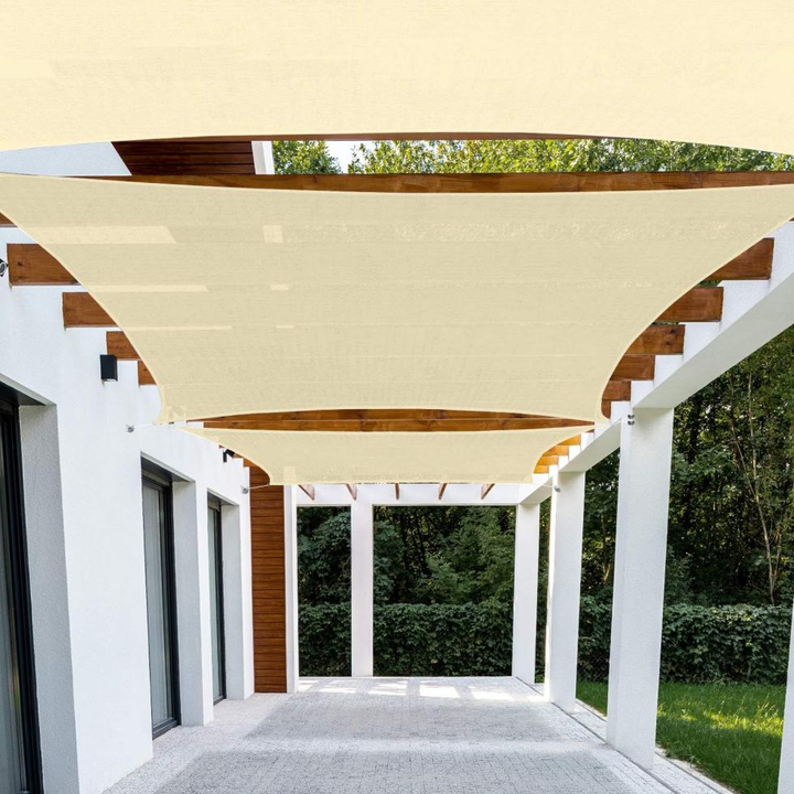 Cream-colored rectangular shade sails lined up in an orderly fashion under the canopy on the front porch of the courtyard.